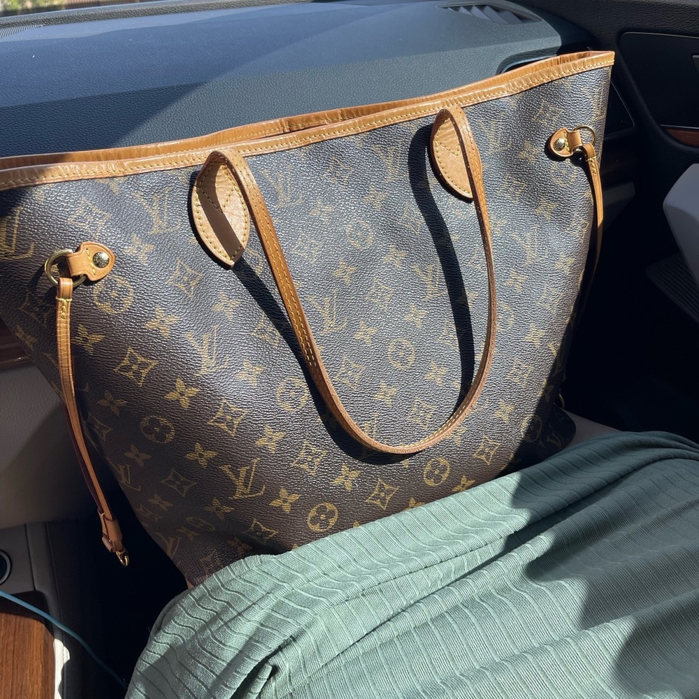 Louis Vuitton never full MM gently used. No marks no damage.